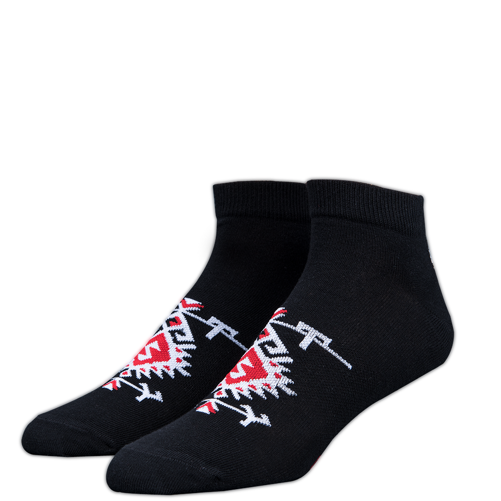 Black socks with red and white designs on a white background