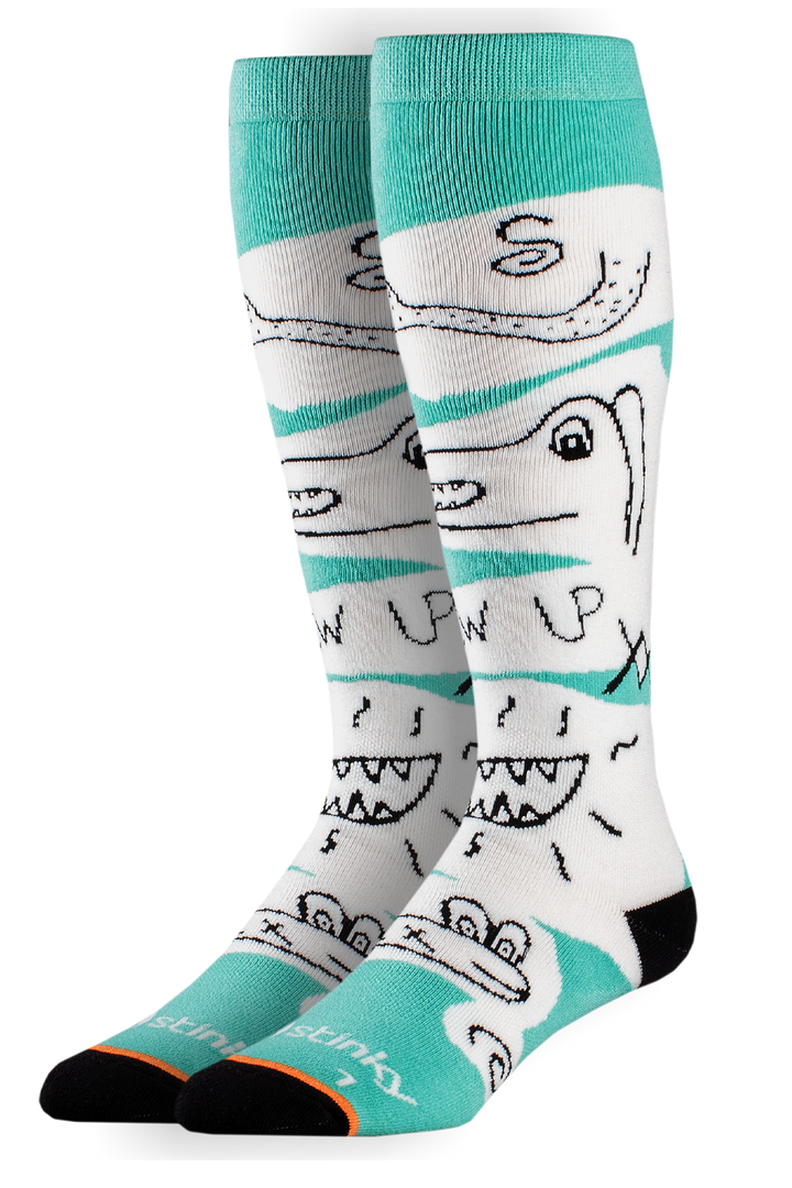 Pair of socks with shark design and teal accents on a white background