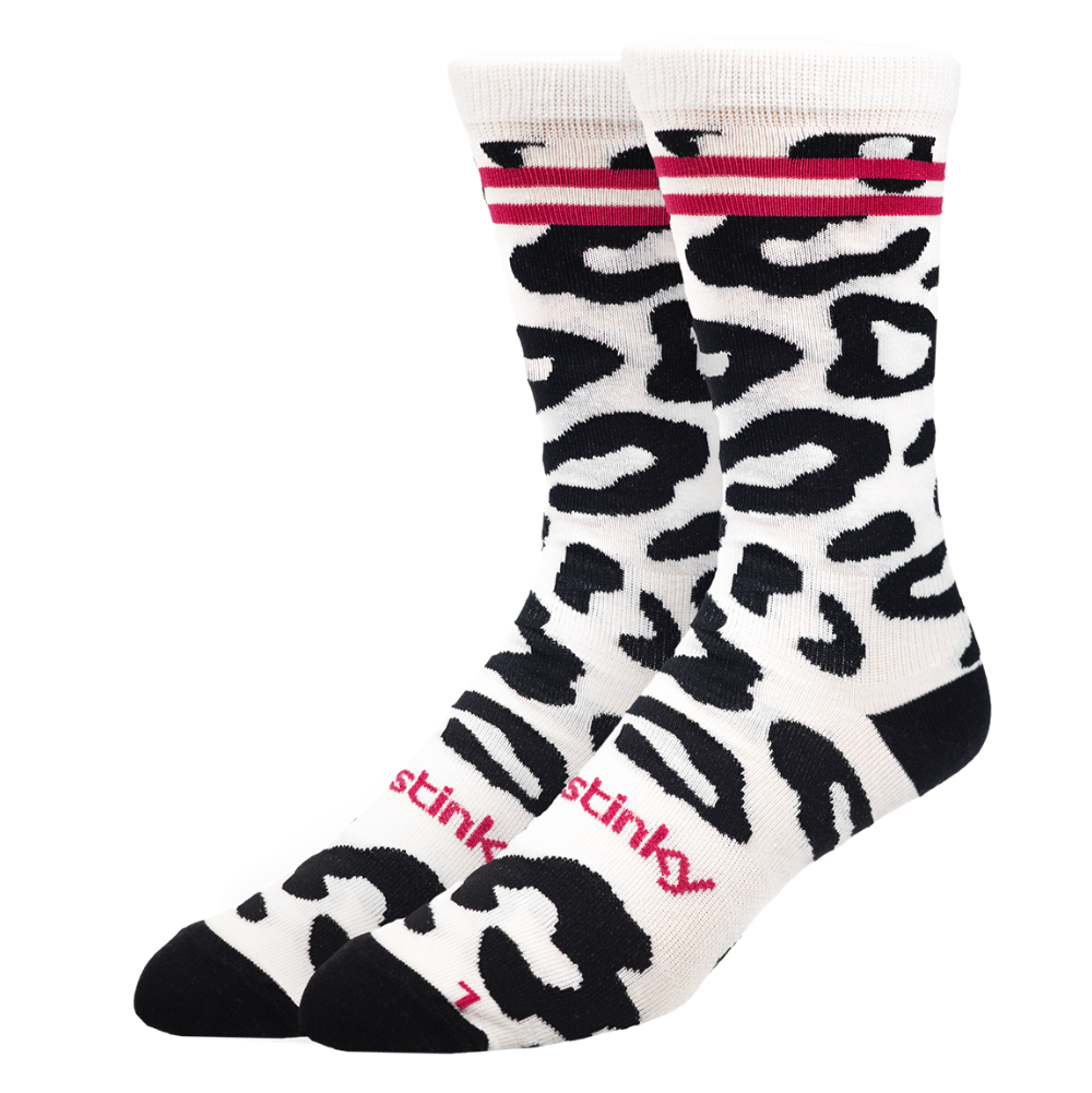 Leopard print sock with pink accents on a white background