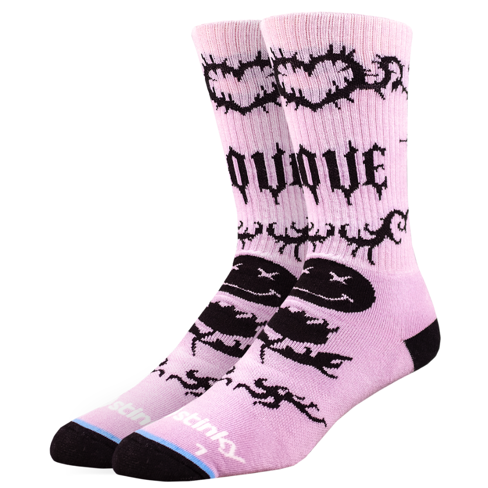 Pink socks with black designs and text on a white background