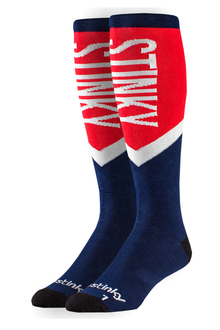 Two pairs of red, white, and blue socks with 'Stink' branding on a white background.
