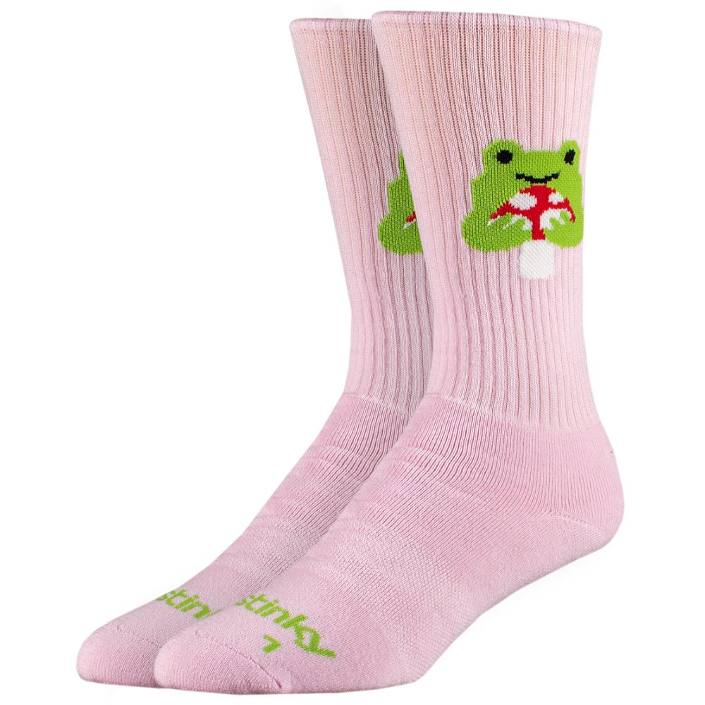 Pink socks with a green frog design on a white background