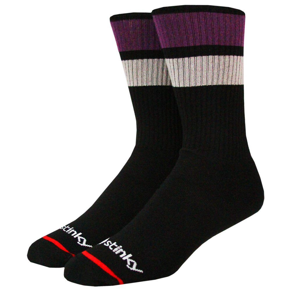 Two black socks with purple and gray accents on a white background
