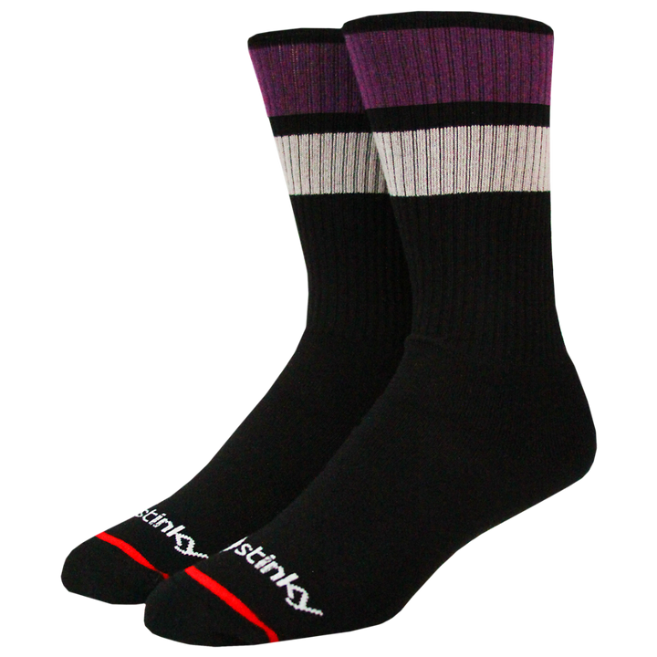 Two black socks with purple and gray accents on a white background