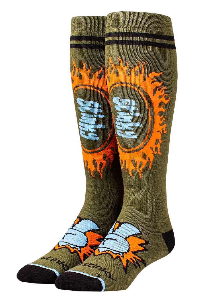 Pair of green socks with orange and blue flame design on a white background