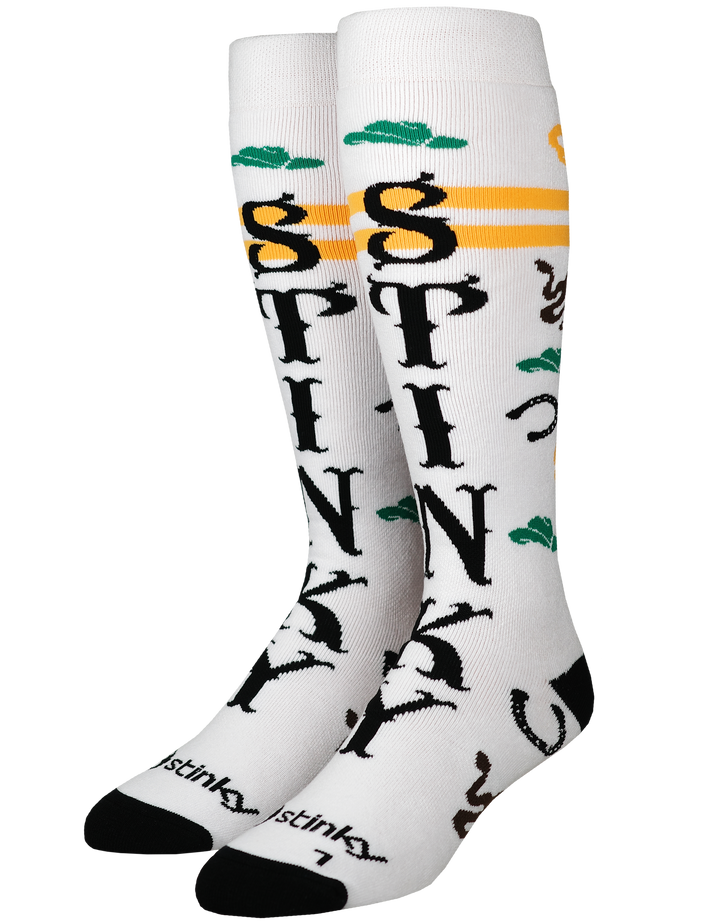 A pair of white knee-high socks with a bold graphic design featuring the word 'STINKY' in black, yellow stripes, green clouds, and black feet/toes.